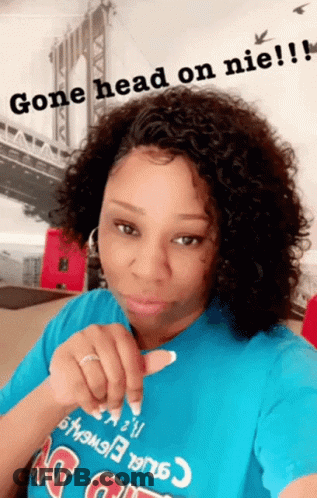 A Woman Wearing A Blue Shirt That Says Gone Head On Nie ! GIF