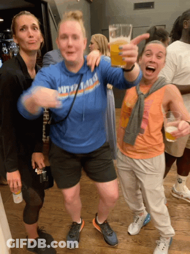 A Woman Wearing A Blue Sweatshirt That Says Duty Of Fame GIF