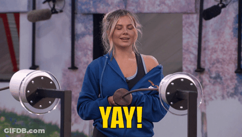 A Woman Wearing A Blue Sweatshirt With The Word Yay On The Front GIF