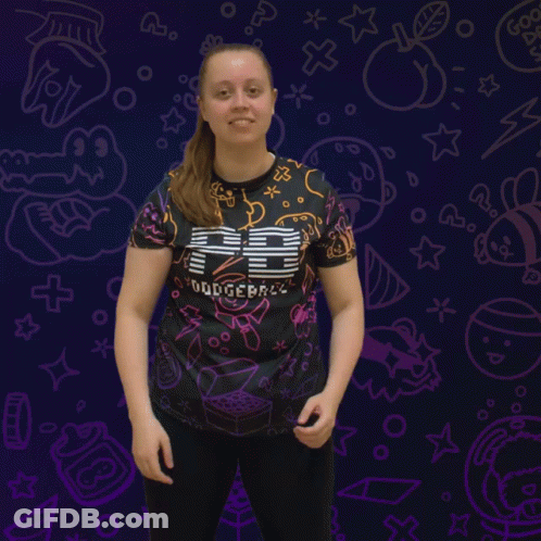 Woman In Booyah Shirt In Front Of Purple Background GIF