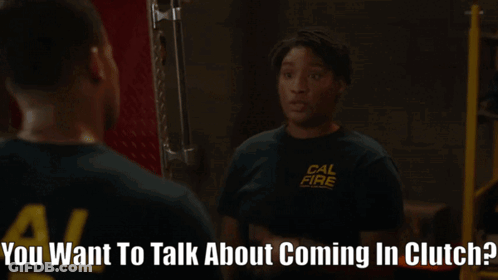 A Woman Wearing A Cal Fire Shirt Is Talking To Another Woman GIF