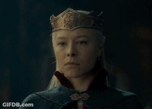 A Woman Wearing A Crown And A Cape GIF