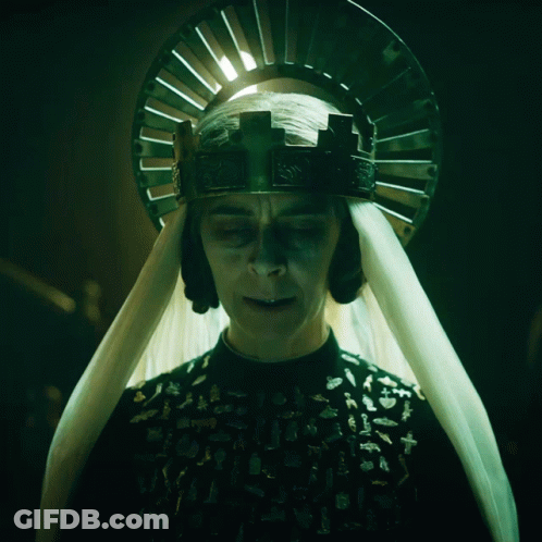 A Woman Wearing A Crown And A White Veil GIF