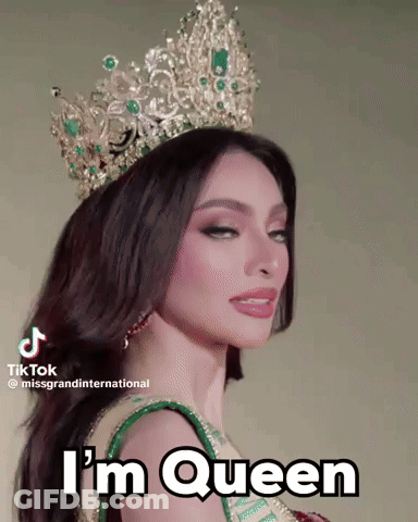 A Woman Wearing A Crown That Says I 'M Queen On It GIF