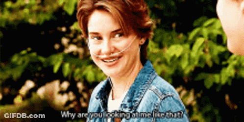 A Woman Wearing A Denim Jacket Is Talking To A Man And Says Why Are You Looking At Me Like That ? GIF