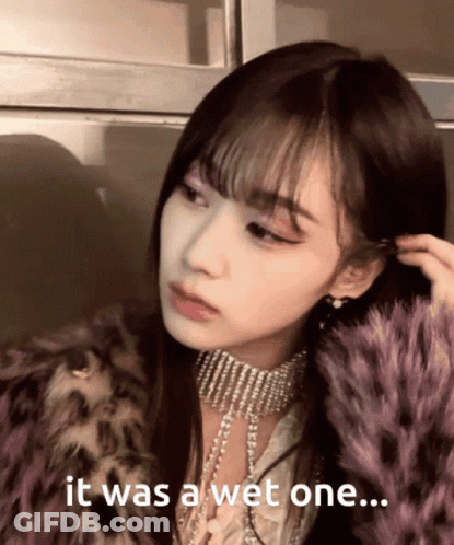 A Woman Wearing A Fur Coat And A Choker Says " It Was A Wet One ... " GIF