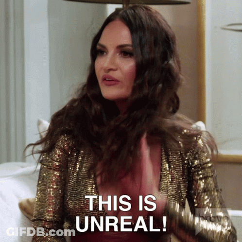 A Woman Wearing A Gold Sequined Jacket Says This Is Unreal GIF