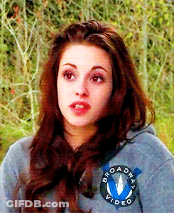 A Woman Wearing A Gray Broadway Video Hoodie GIF