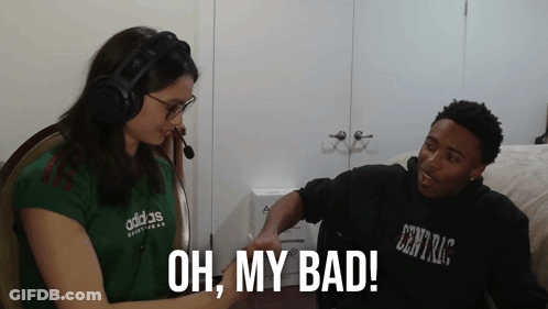 A Woman Wearing A Green Adidas Shirt Talks To A Man GIF