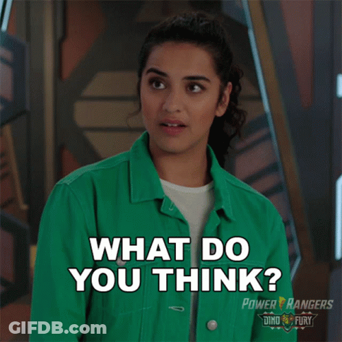 A Woman Wearing A Green Jacket Says What Do You Think GIF