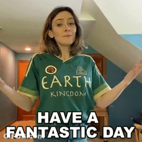 A Woman Wearing A Green Shirt That Says " Earth Kingdom " GIF