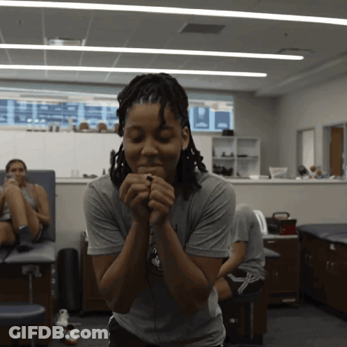 Woman Wearing NC State Shirt GIF