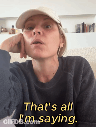 A Woman Wearing A Hat And A Black Sweater Says That 'S All I 'M Saying GIF