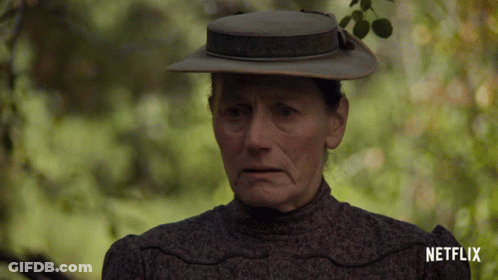 A Woman Wearing A Hat And A Netflix Logo On The Bottom GIF