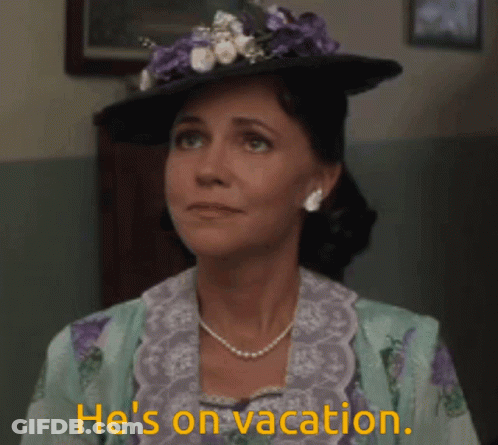 A Woman Wearing A Hat And A Pearl Necklace Says " He 'S On Vacation " GIF