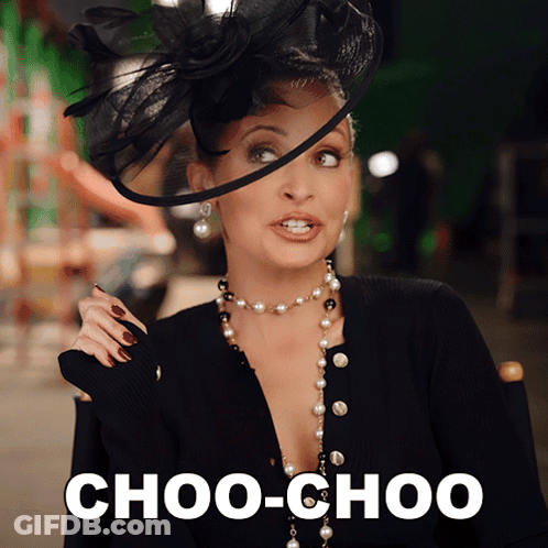 A Woman Wearing A Hat And Pearls Says Choo-Choo On The Bottom GIF