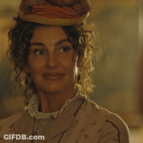 A Woman Wearing A Hat Is Smiling And Says I Can Do That GIF
