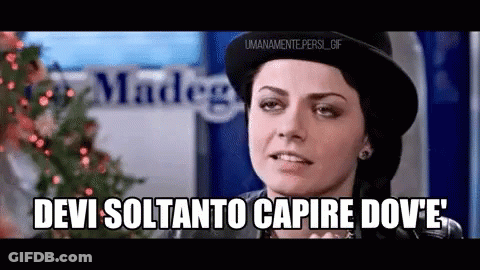 A Woman Wearing A Hat Says Devi Soltanto Capire Dove 'E GIF