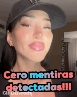 A Woman Wearing A Hat With The Words Cero Mentiras Detectadas Written On It GIF