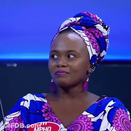 A Woman Wearing A Head Scarf Has A Name Tag That Reads Mpho GIF