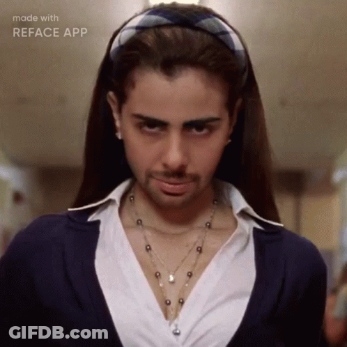 A Woman Wearing A Headband And A Necklace Has A Beard Made With Reface App GIF