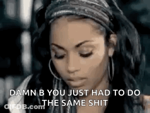 A Woman Wearing A Headband And Hoop Earrings Is Talking About Something . GIF