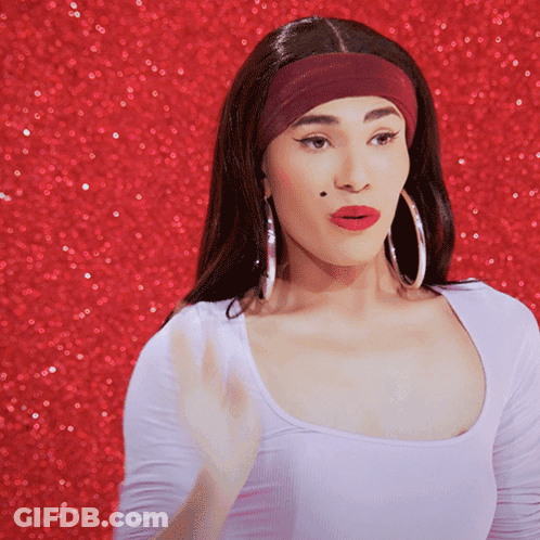 Surprised Woman Wearing Headband And Hoop Earrings GIF