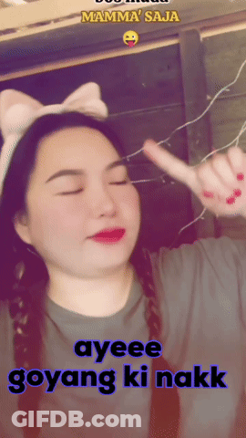A Woman Wearing A Headband That Says Mamma 'Saja On It GIF