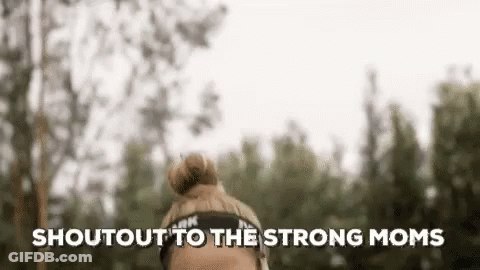A Woman Wearing A Headband With The Words `` Shout Out To The Strong Moms '' Written On It . GIF
