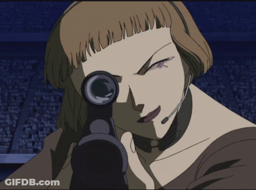 A Woman Wearing A Headset Is Holding A Gun In Her Hand GIF