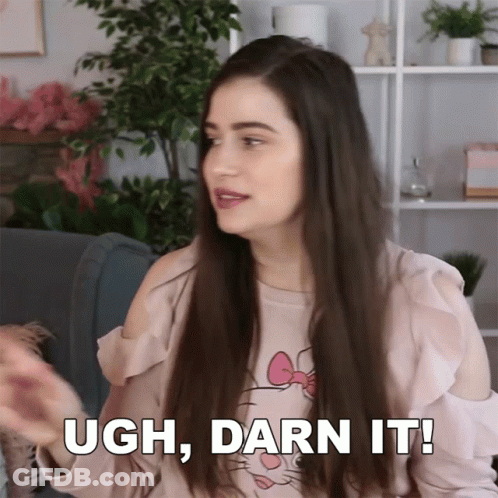 A Woman Wearing A Hello Kitty Shirt Says " Ugh Darn It " GIF