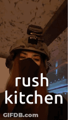 A Woman Wearing A Helmet And A Mask With The Words Rush Kitchen On The Bottom GIF