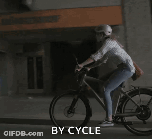 A Woman Wearing A Helmet Is Riding A Bike With The Words By Cycle Written Below Her GIF