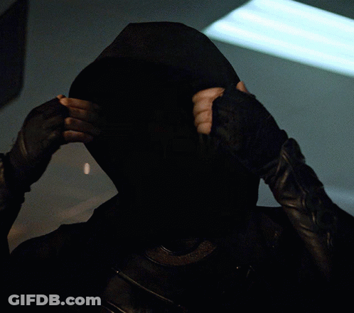 A Woman Wearing A Helmet With Horns On Her Head Looks At The Camera GIF