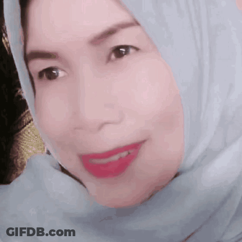 A Woman Wearing A Hijab Has A Sticker That Says Oldies Goodies On Her Face GIF