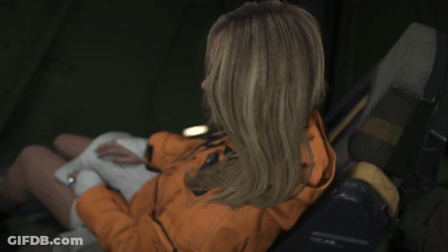 A Woman Wearing A Jacket That Says ' Ascent ' On It Is Giving A Thumbs Up GIF