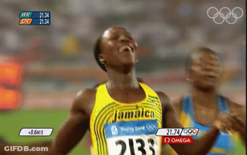 A Woman Wearing A Jamaica Jersey With The Number 2133 On It GIF
