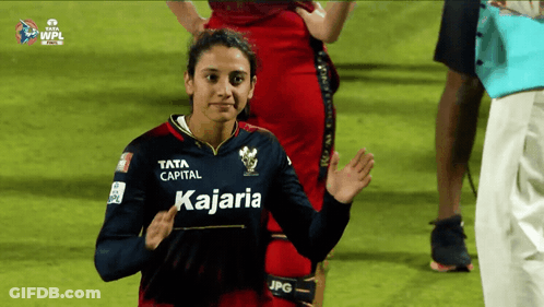 A Woman Wearing A Jersey That Says Kajaria GIF