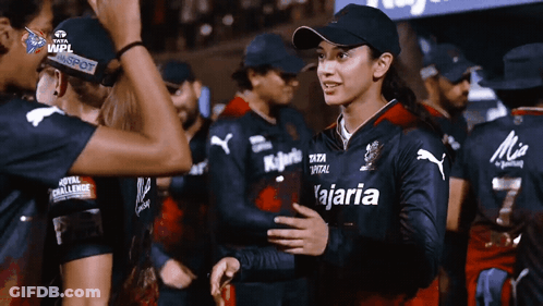 A Woman Wearing A Jersey That Says " Kajaria " On It GIF