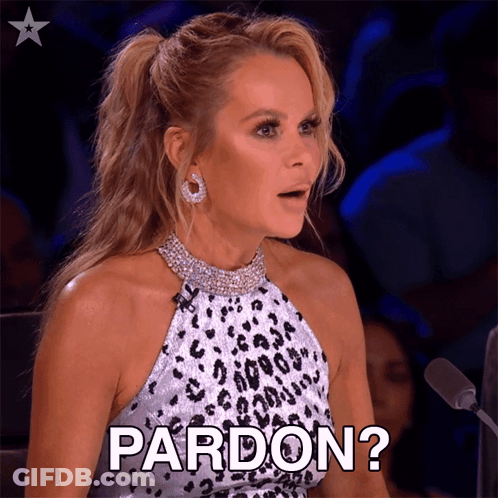 A Woman Wearing A Leopard Print Dress Says Pardon GIF