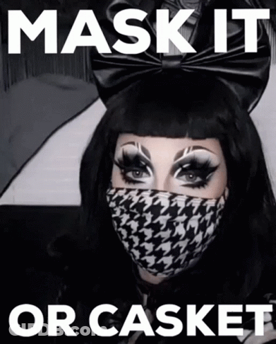 A Woman Wearing A Mask With The Words Mask It Or Casket GIF