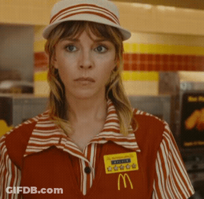 A Woman Wearing A Mcdonald 'S Uniform Has A Name Tag With The Letter M GIF
