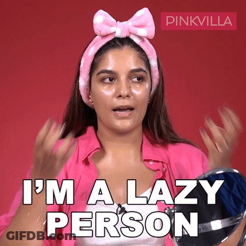 A Woman Wearing A Pink Headband And A Pink Shirt Says " I 'M A Lazy Person " GIF