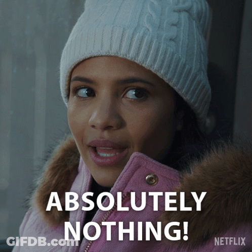 A Woman Wearing A Pink Jacket And A White Hat Says " Absolutely Nothing " GIF