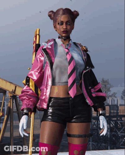 A Woman Wearing A Pink Jacket And Tie Is Holding A Gun GIF