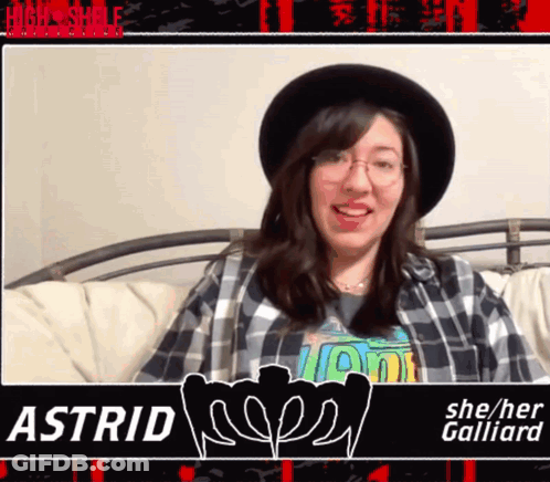 A Woman Wearing A Plaid Shirt And A Hat With The Name Astrid GIF