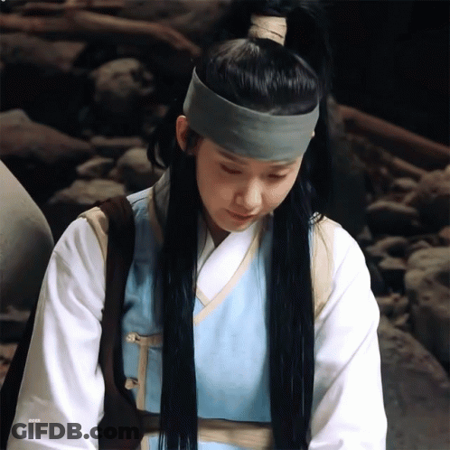 A Woman Wearing A Ponytail And A Headband With The Letters Eeea On The Bottom GIF