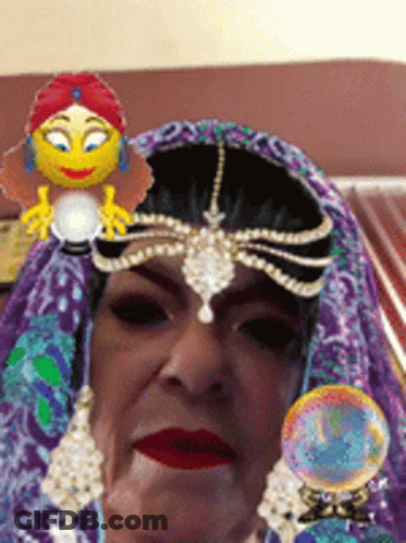 A Woman Wearing A Purple Veil With A Smiley Face On Her Head GIF