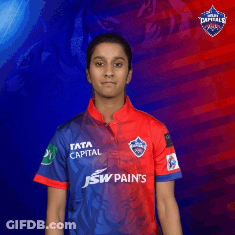 A Woman Wearing A Red And Blue Shirt That Says J & W Paints GIF