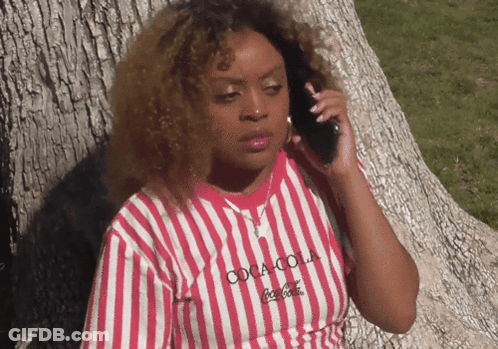 Woman Wearing Coca Cola Shirt GIF